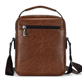 Bolsa de Ombro Masculina em Couro Joseph Green, Bolsa masculina em couro, Bolsa de ombro Joseph Green, Couro genuíno, Estilo masculino elegante, Bolsa versátil, Acessório de couro, Bolsa de couro verde, Elegância masculina, Compartimentos internos, Bolsa prática, Alças ajustáveis, Couro de alta qualidade, Moda masculina, Bolsa sofisticada, Bolsa para homem, Estilo versátil, Couro texturizado, Bolsa de alta durabilidade, Bolsa de moda masculina, Bolsa para todas as ocasiões