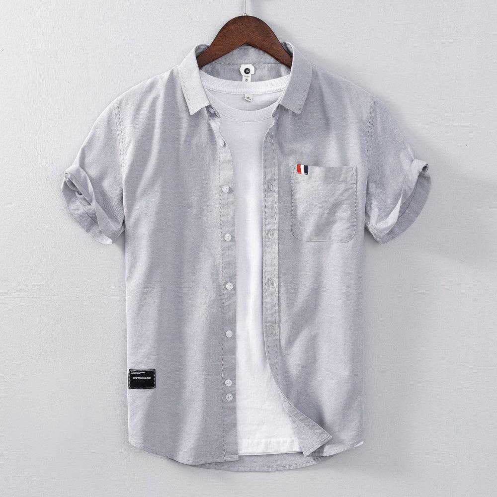 Camisa Masculina de Manga Curta Kaleb Warren,  Camisa masculina manga curta, Camisa Kaleb Warren, Elegância casual masculina, Estilo versátil confortável, Moda masculina sofisticada, Camisa social masculina, Camisa elegante casual, Camisa premium masculina, Camisa moda masculina, Camisa casual refinada, Camisa masculina moderna, Camisa conforto elegância, Camisa versatilidade masculina, Camisa estilo sofisticado, Camisa moda contemporânea, Camisa manga curta premium, Camisa masculina casual