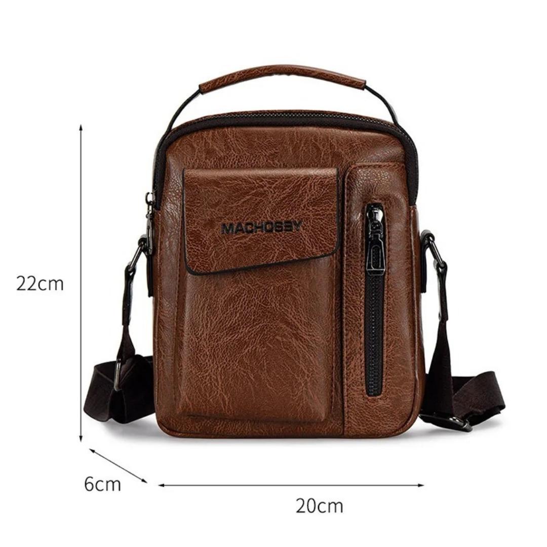 Bolsa de Ombro Masculina em Couro Joseph Green, Bolsa masculina em couro, Bolsa de ombro Joseph Green, Couro genuíno, Estilo masculino elegante, Bolsa versátil, Acessório de couro, Bolsa de couro verde, Elegância masculina, Compartimentos internos, Bolsa prática, Alças ajustáveis, Couro de alta qualidade, Moda masculina, Bolsa sofisticada, Bolsa para homem, Estilo versátil, Couro texturizado, Bolsa de alta durabilidade, Bolsa de moda masculina, Bolsa para todas as ocasiões